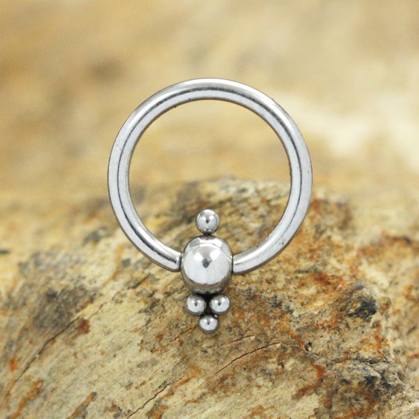 steel BCR piercing,piercing clusters,steel BCR,helix piecing,snug piercing,conch piercing