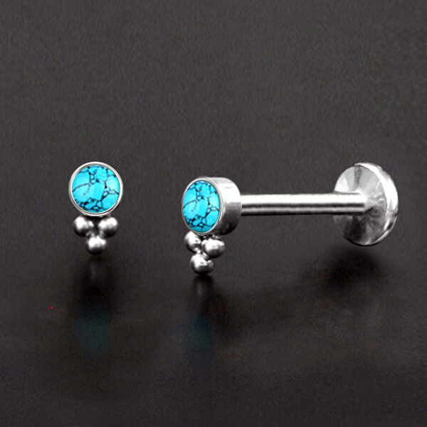 steel labret piercing,lip piercing,flat piercing,upper lobe piercing,tragus piercing