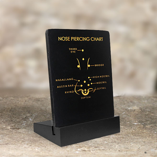 lip piercing,body piercings,wooden jewelry display