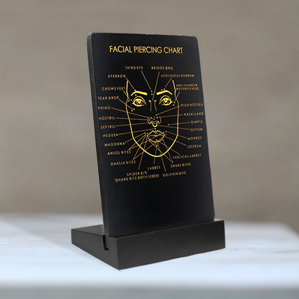 facial piercing,body piercings,lip piercing, nose piercings,eyebrow piercings,wooden jewelry display
