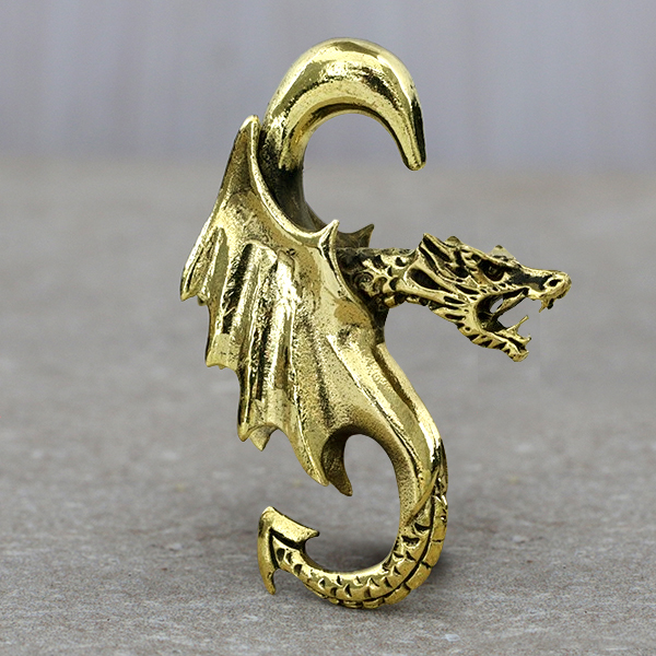 dragon,brass,ear,weight