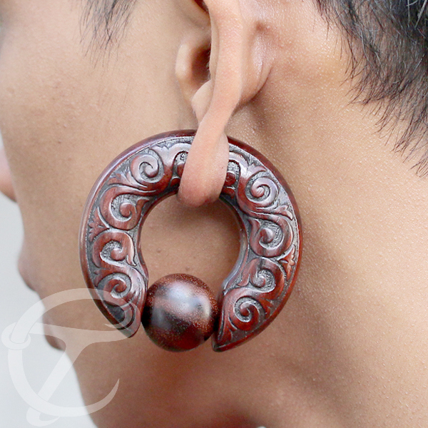 body piercing,body jewelery,wood piercing