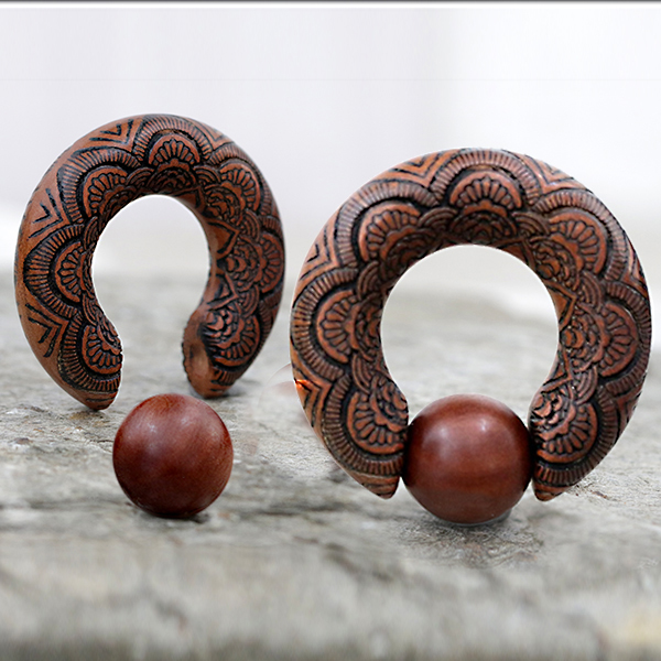 body piercing,body jewelery,wood piercing