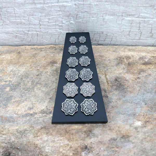 body piercing jewelry display, ear plugs,plug display