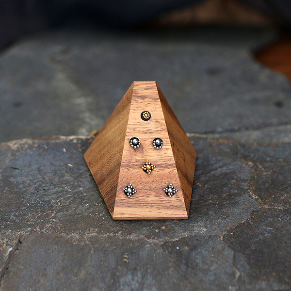 body piercing jewelry display,labret piercing,labrets.wooden jewelry display