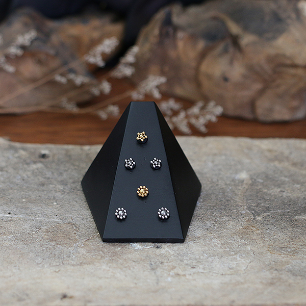 body piercing jewelry display,labret piercing,labrets.wooden jewelry display